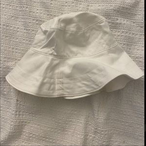 White floppy bucket hat